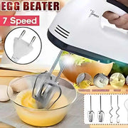 Handheld electric egg beater with 7 speed settings being used to mix eggs in a bowl.