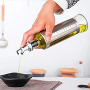 500ml Glass Oil Dispenser – Kitchen Oil Jar with Stainless Steel Cover - KT Bazar BD Shop