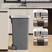 Gray trash bin with text indicating two ways to open the lid in a kitchen setting.