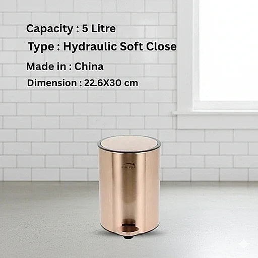 Rose gold trash bin with product details on a white tiled wall background