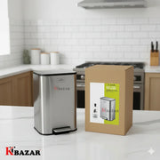 Stainless steel trash can and its box on a kitchen counter with 'Kibazar' branding.