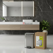 Bathroom setting with a trash can and box labeled 'KBazar' on a marble countertop.